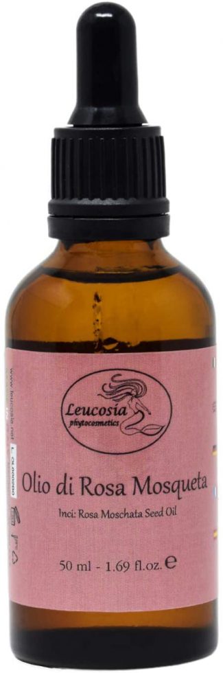 Olio Essenziale Di Rosa In Una Bottiglia Di Vetro E Nelle Rose Dei Fiori Image108207785